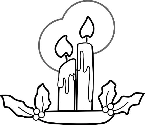 Coloring book lit candles on the table at Christmas